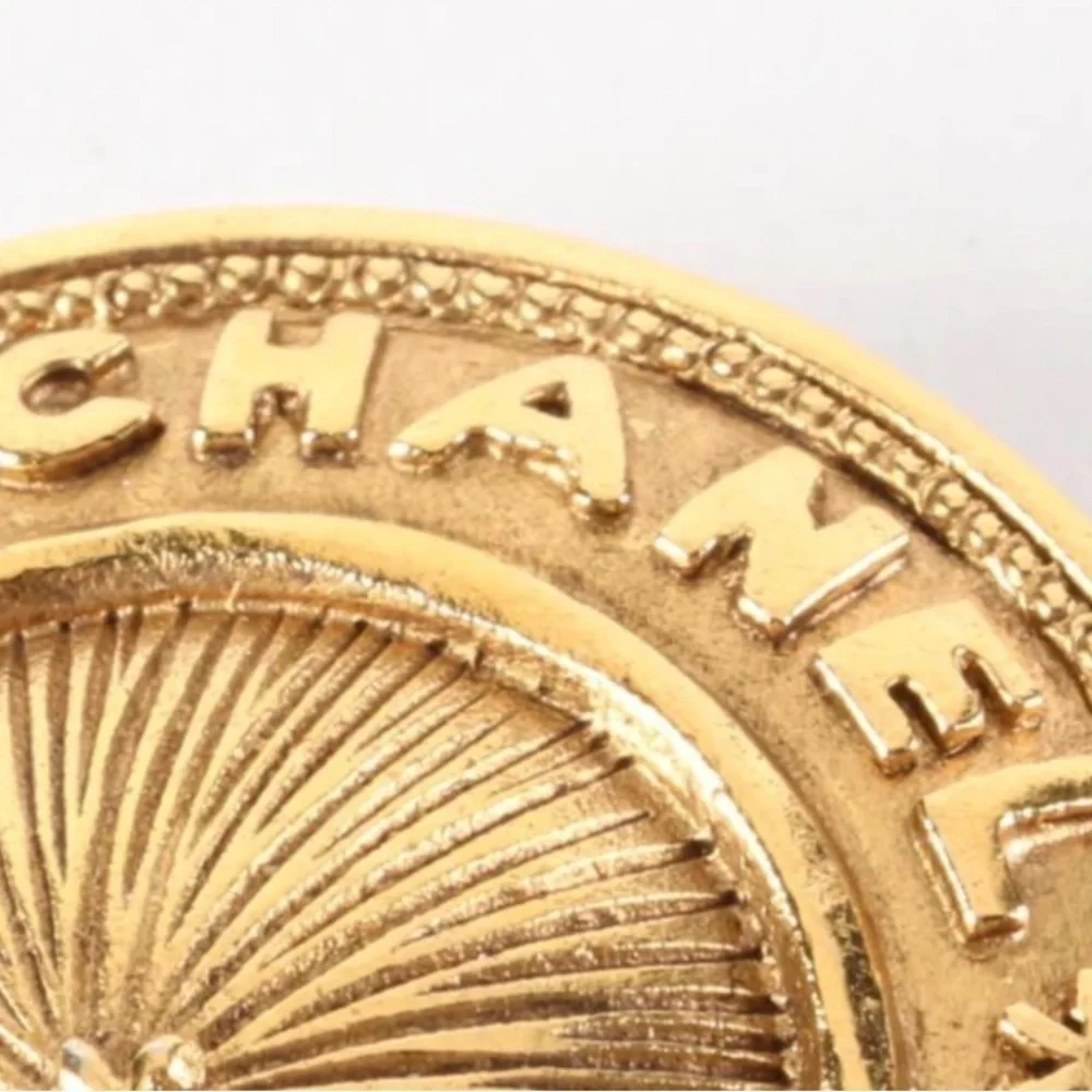 Vintage gold Chanel Brooch.